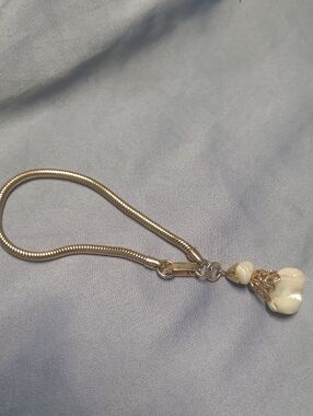 Gold-Tone Snake Chain Bracelet with Cream Shell Charm